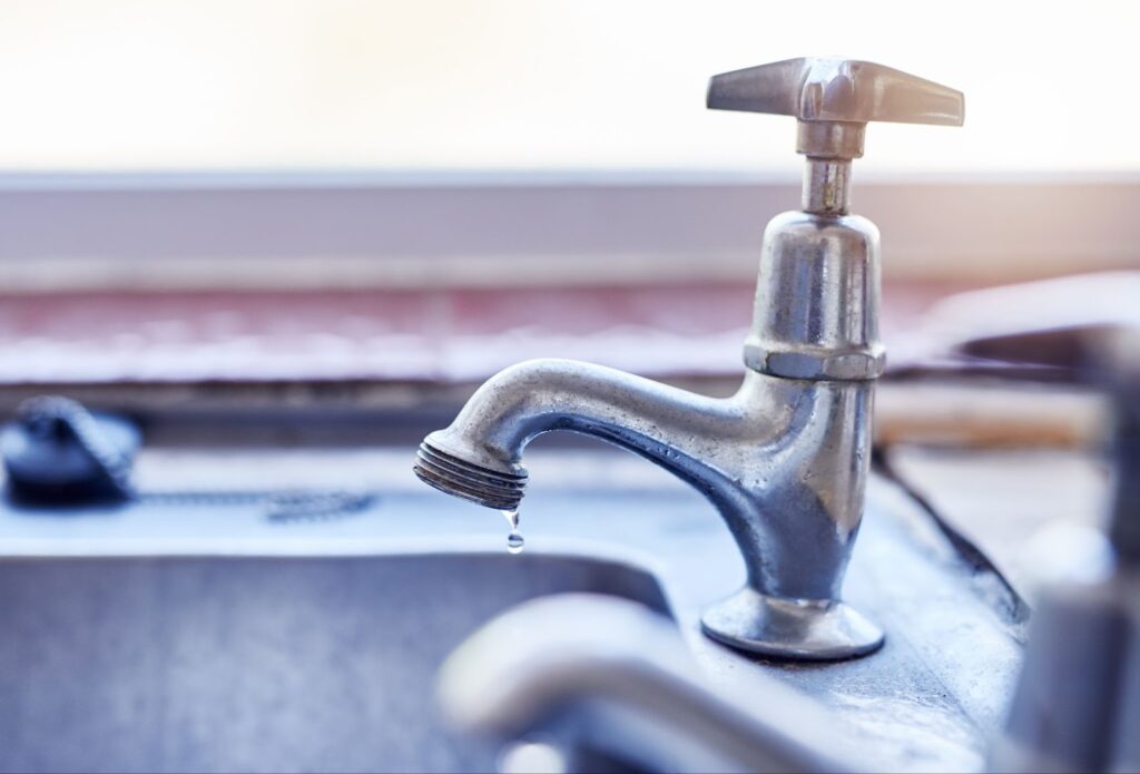 Tap with water dripping out