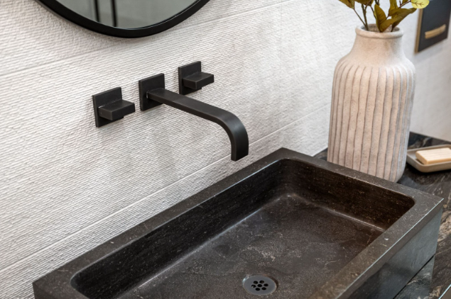 black tap in a bathroom
